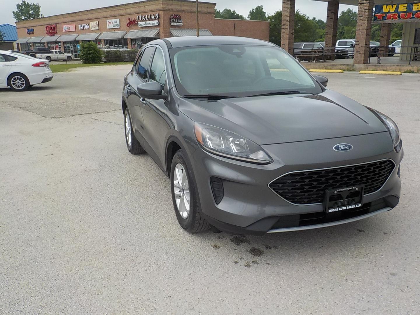 2021 Gray /Lt gray Ford Escape (1FMCU0G66MU) , Auto transmission, located at 1617 W Church Street, Livingston, TX, 77351, (936) 327-3600, 30.710995, -94.951157 - These vehicles get over 30 mpg on the highway!! - Photo#2